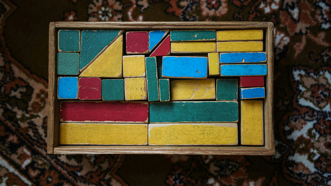 a box of colorful wooden blocks